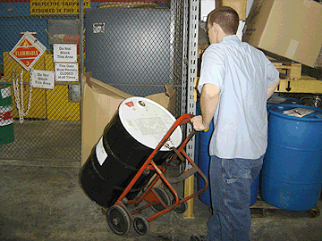 Contaminated solvents must be stored in suitable containers in an acceptable storage area and then transported as hazardous waste.