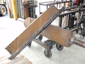 Before | Sonoco Clear Pack needed to repair one of its large heat transfer rolls at the firm’s sheet extrusion operation. When the outer shell was removed, a number of internal problems, including some leaks, were identified and repaired.